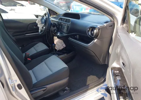 2015 Toyota Prius C Four/One/Three/Two из США, поврежденный, VIN JTDKDTB32F1582403